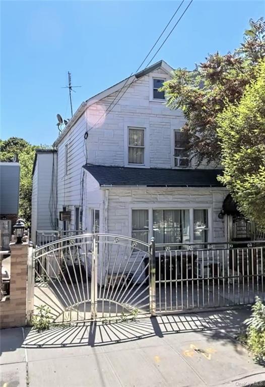 a front view of a house with a balcony