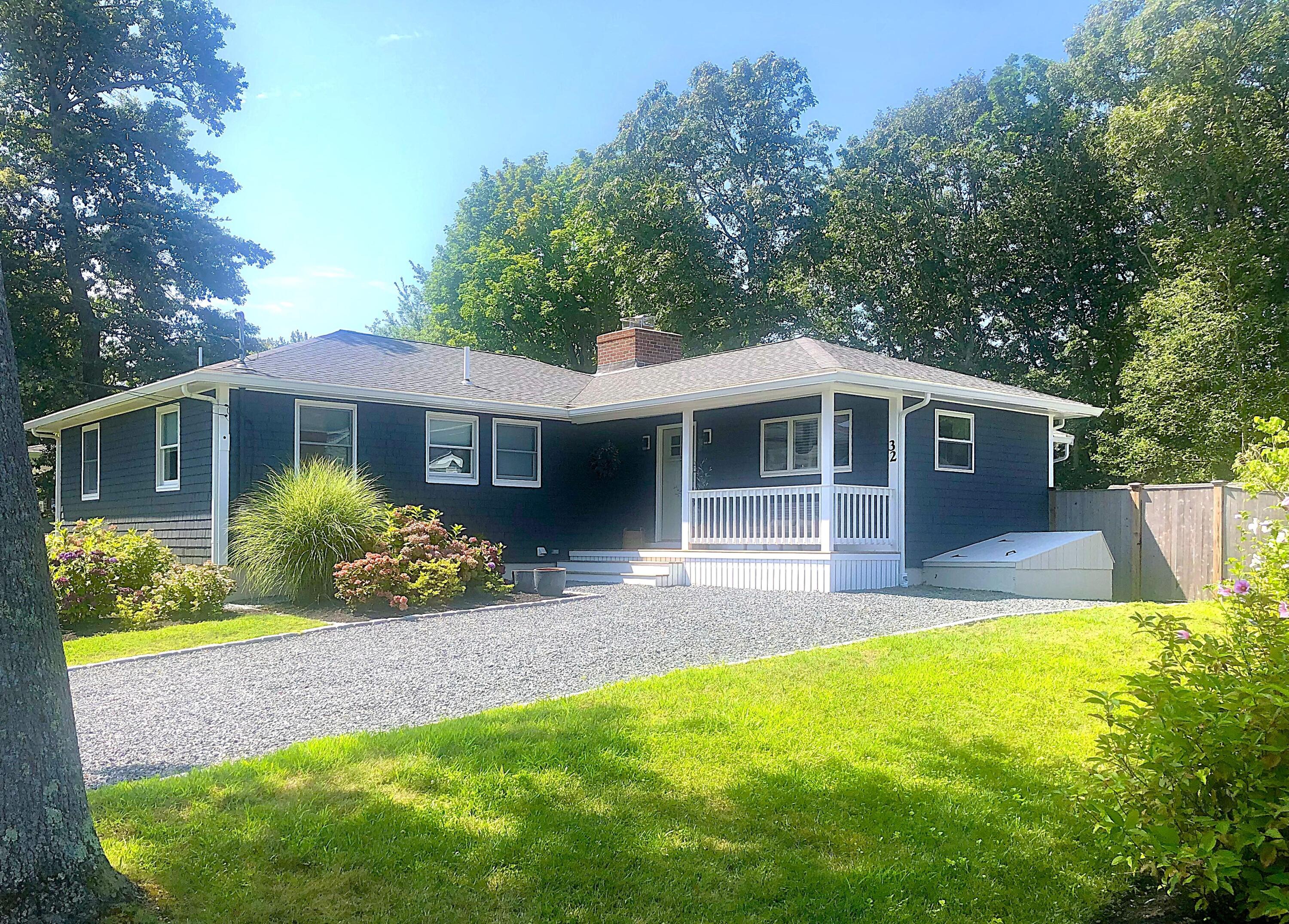 a front view of a house with a porch