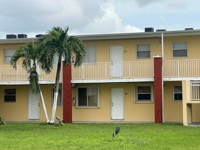 a front view of house with yard