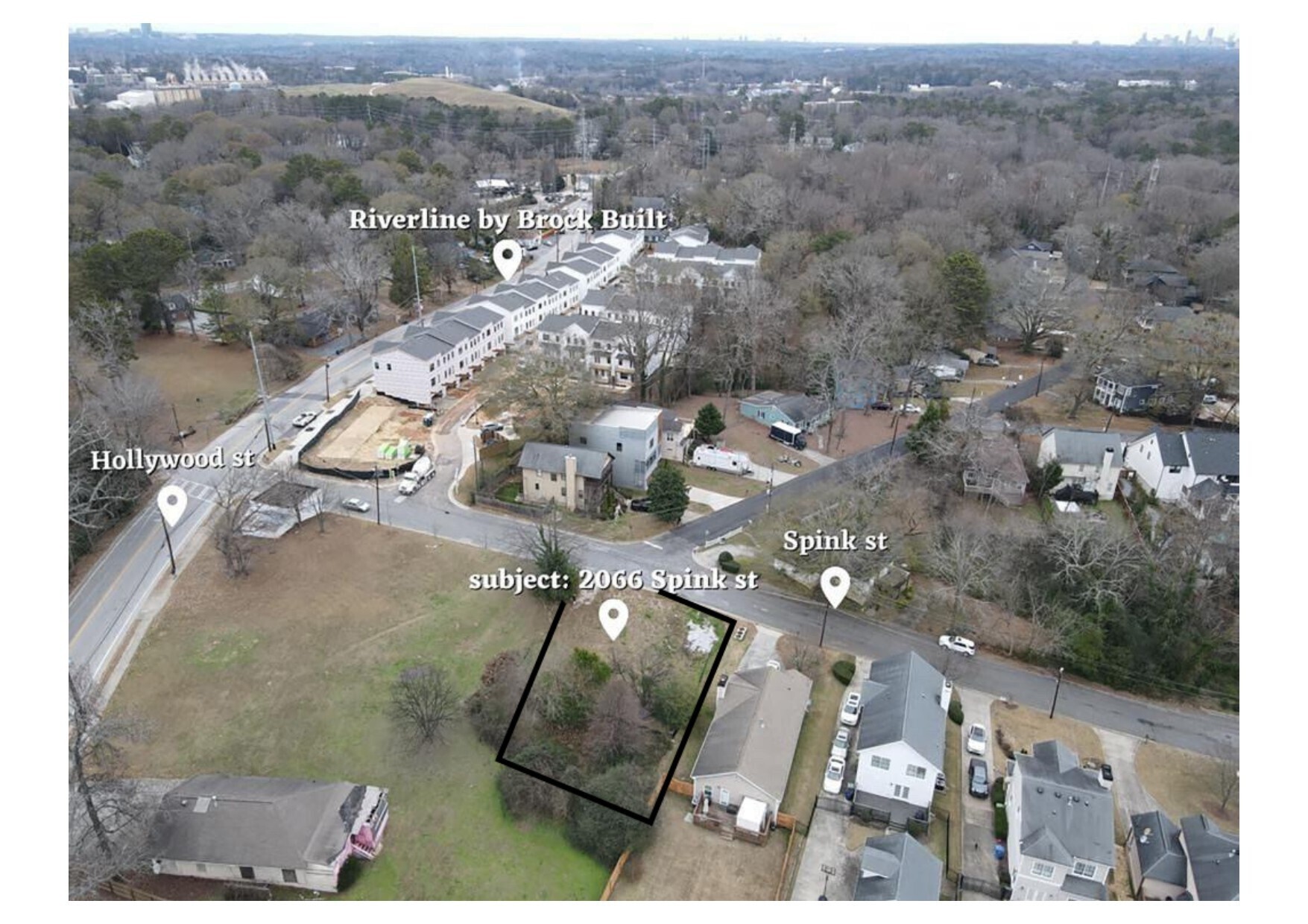 an aerial view of a residential houses with outdoor space