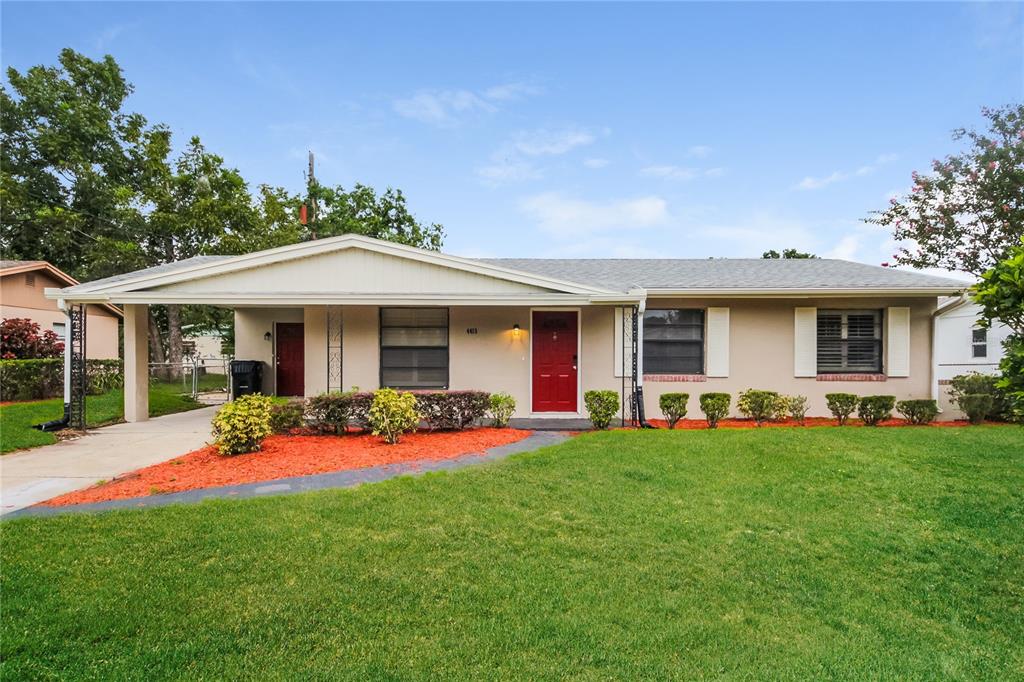 front view of a house with a yard