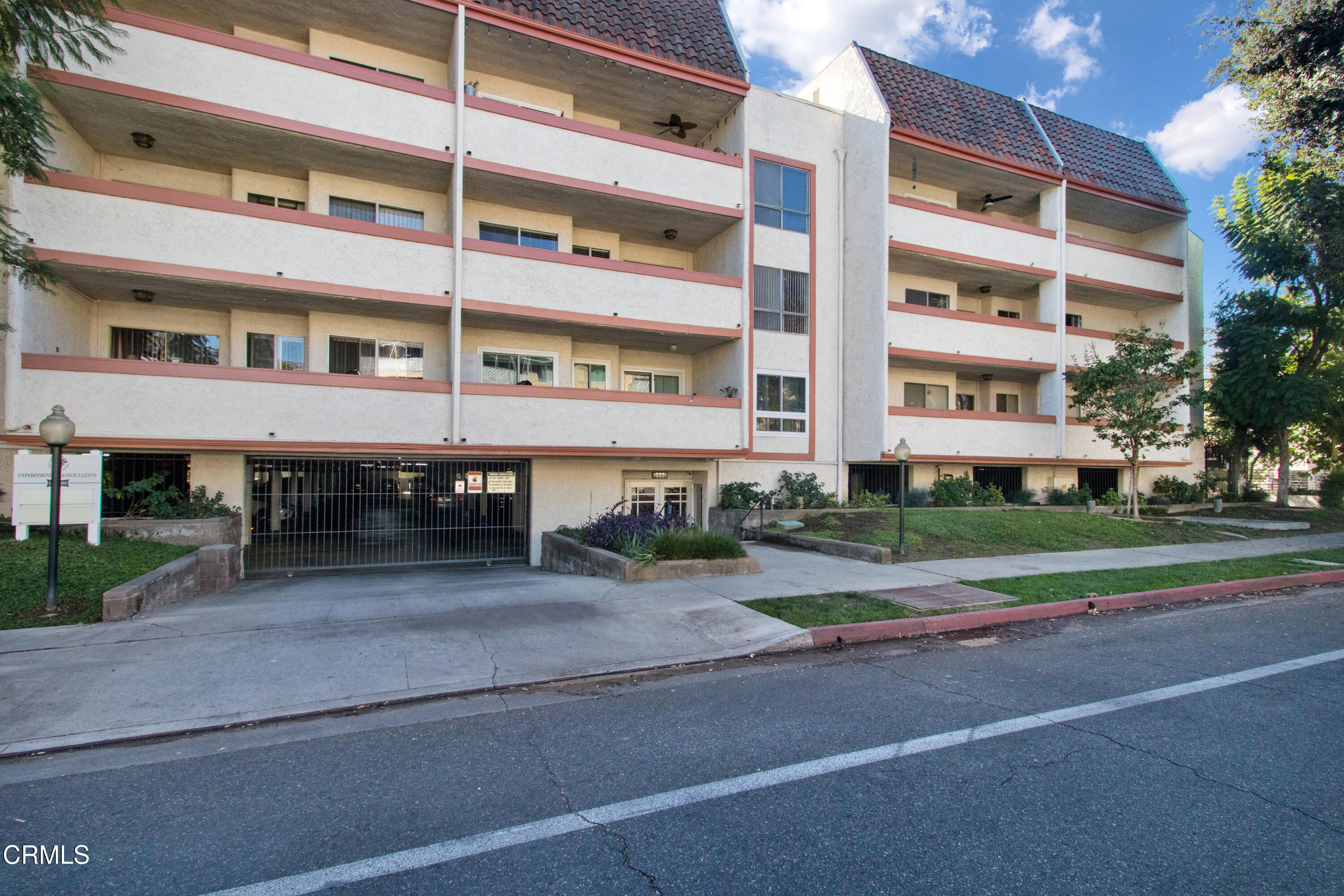 a front view of building with street