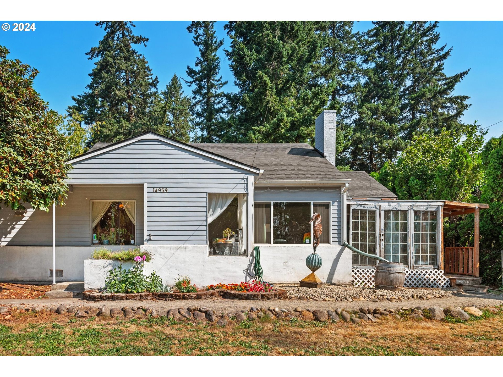 a house view with a garden space