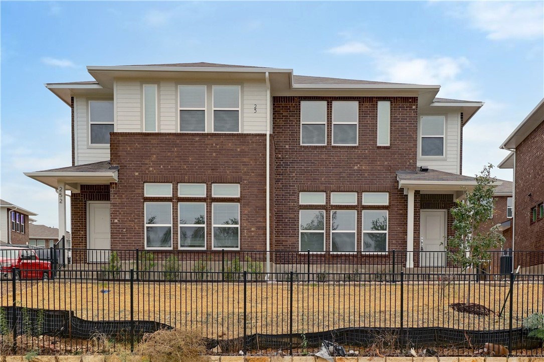 a front view of a house with a balcony