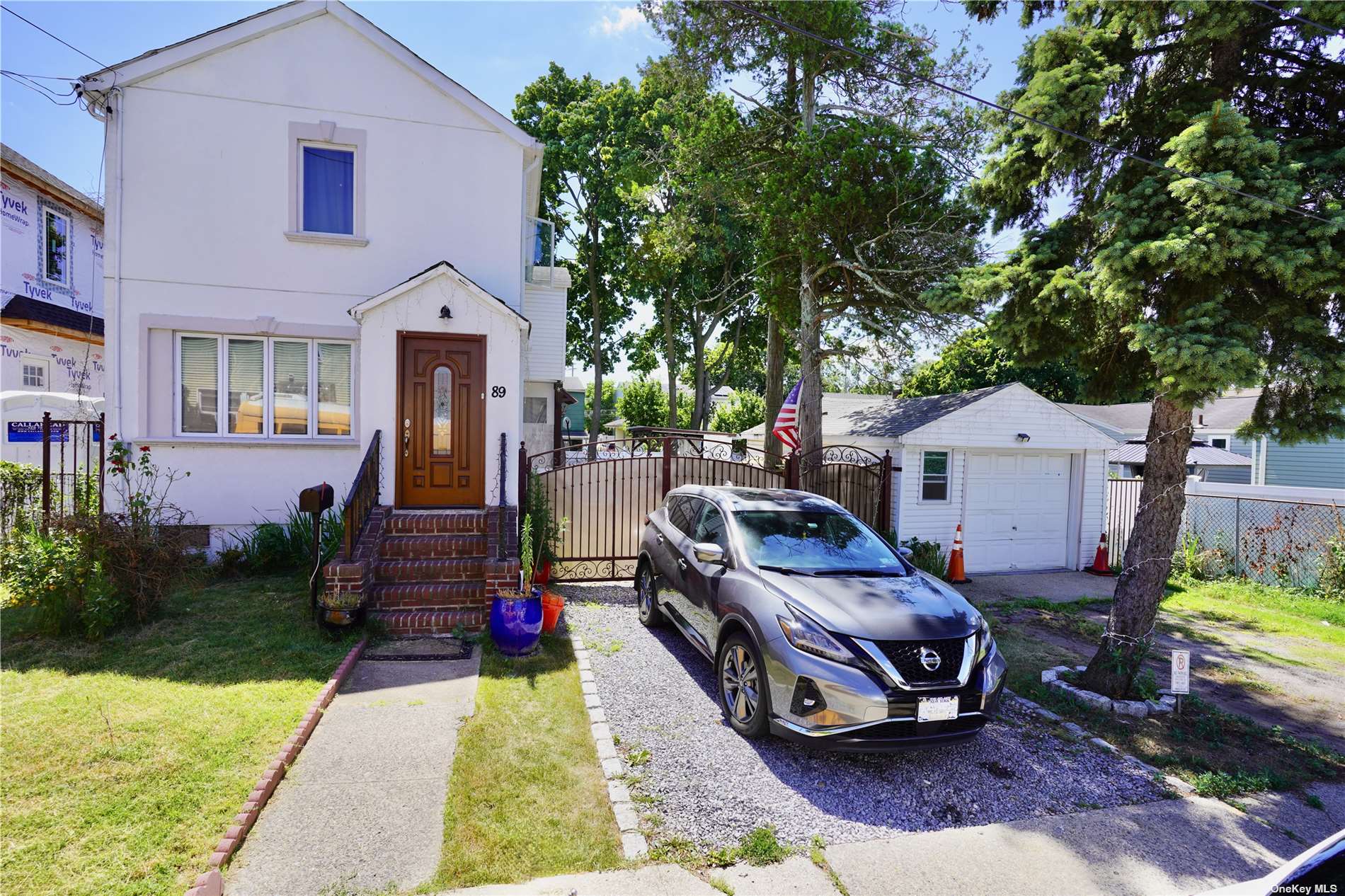 a car parked in front of a house