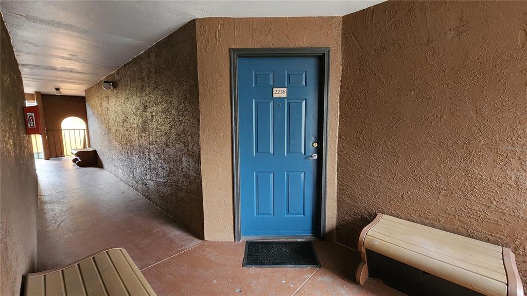 a view of room with furniture and wooden floor