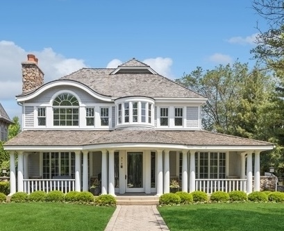 front view of a house with a yard