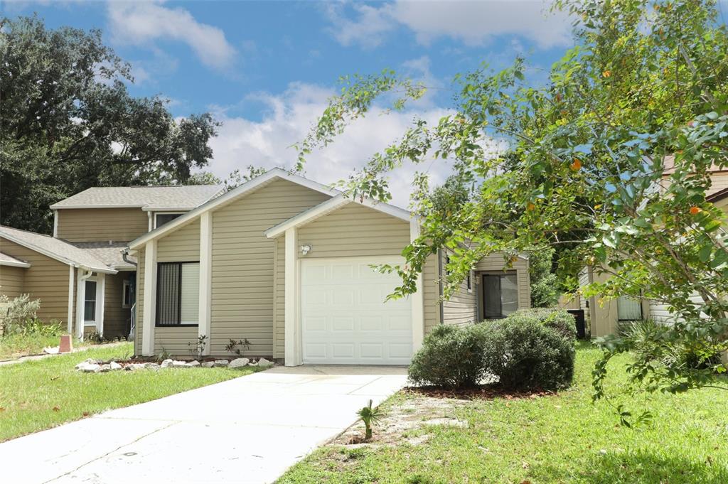 front view of a house with a yard