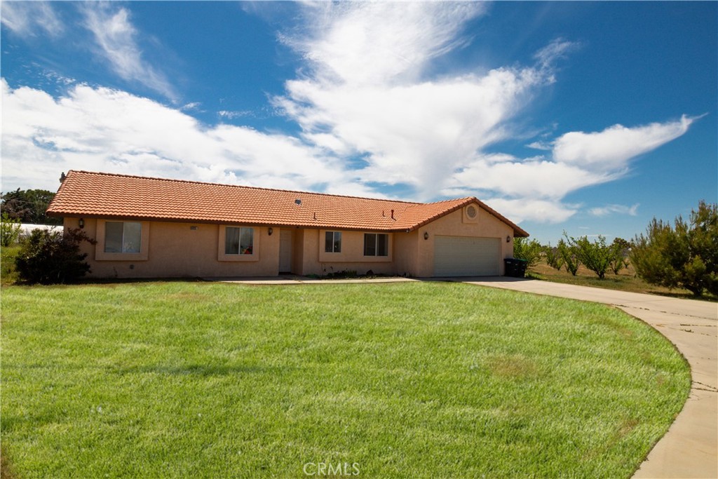 a large building with a big yard