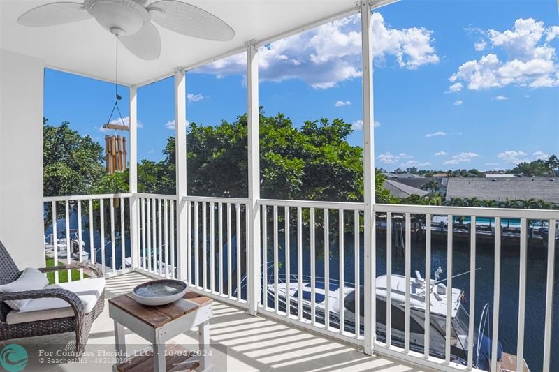 a view of a chairs on the roof deck