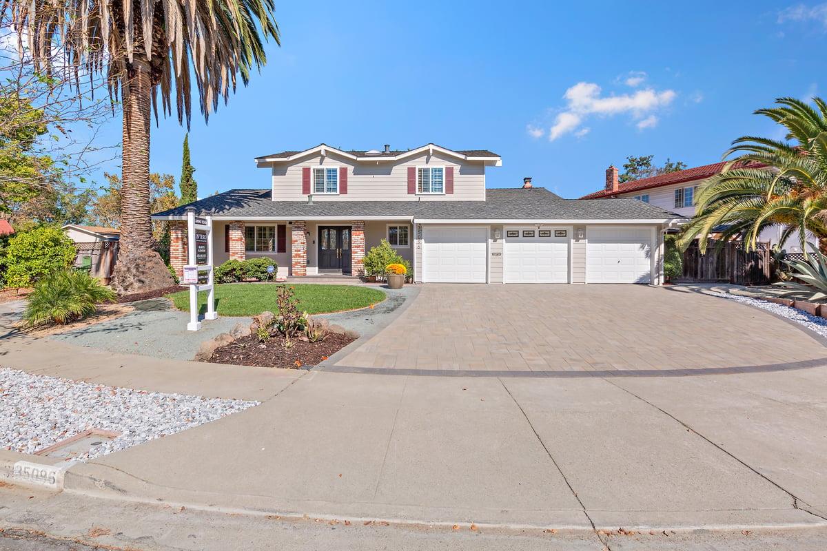 front view of a house with a yard