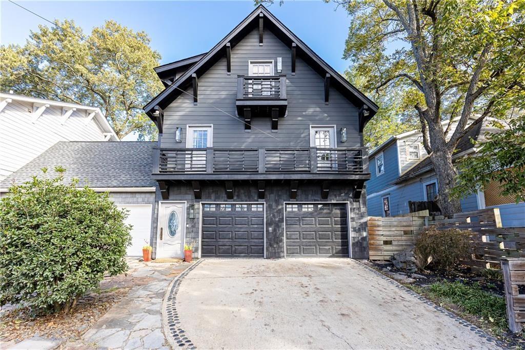 a front view of a house with garage