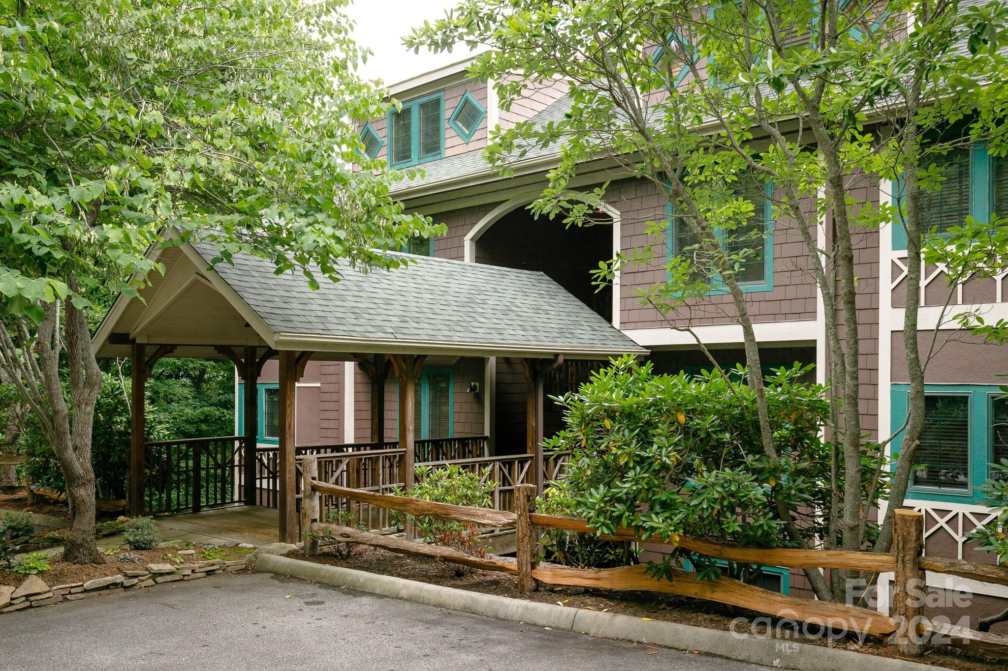 front view of a house with a garden