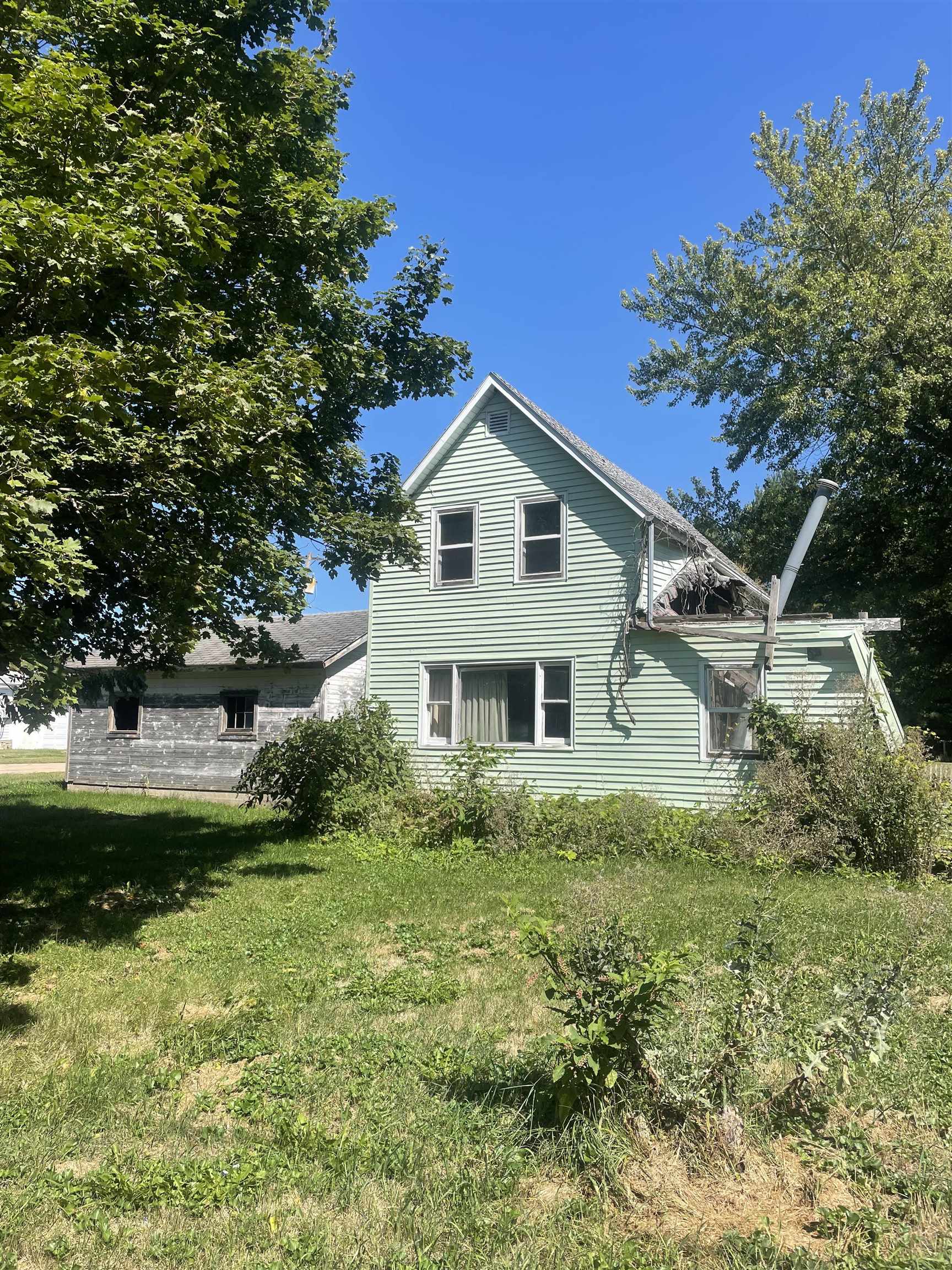 a house that has a lot of plants in it