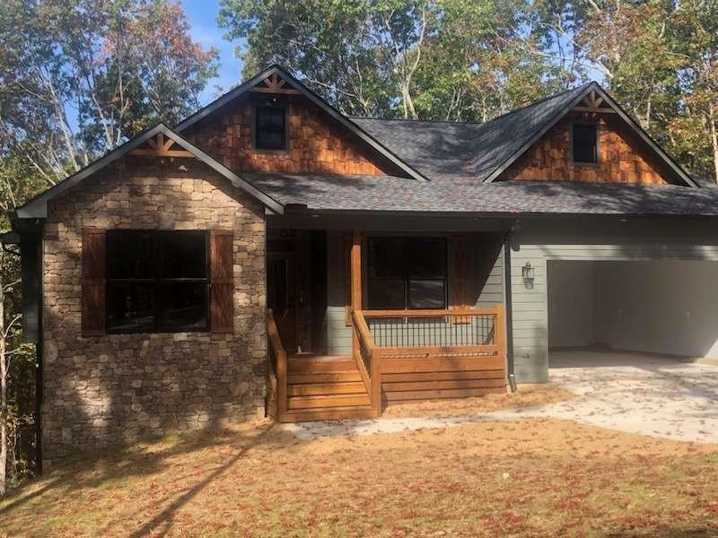 a house with trees in the background