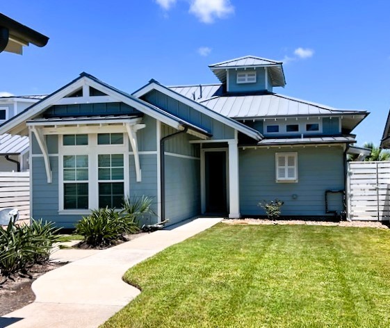 a front view of a house with garage