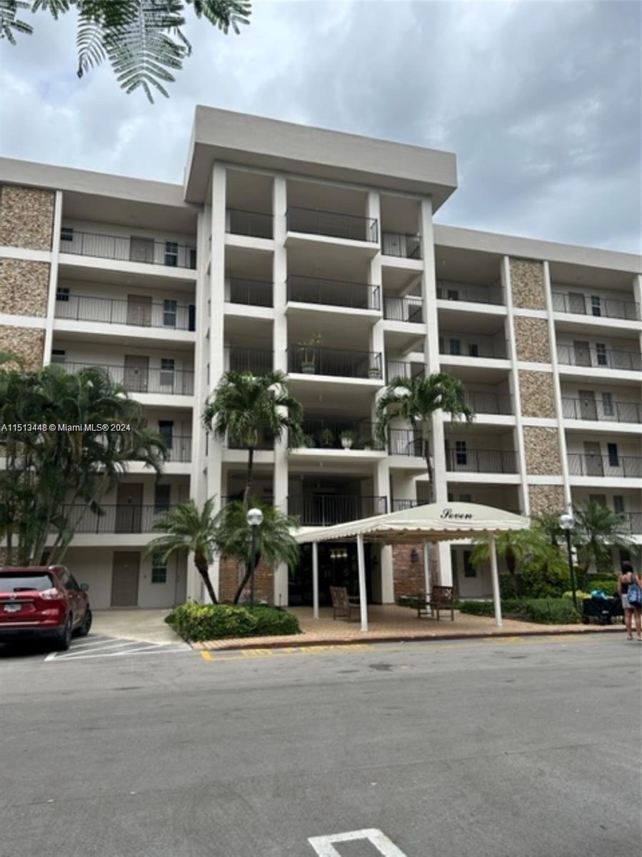 a front view of a building with windows