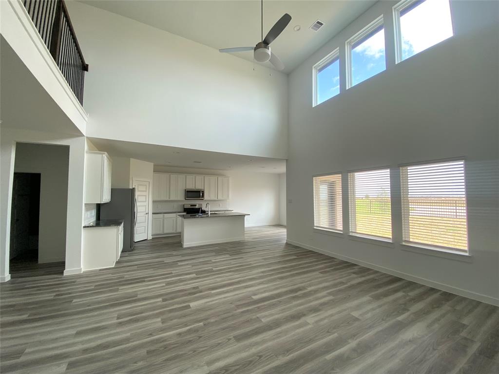 High Ceiling and water view backyard. Very open floor plan.