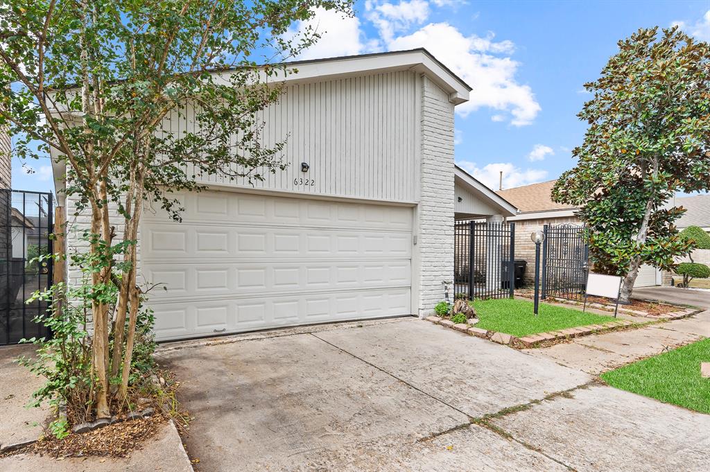 a view of outdoor space yard and garage