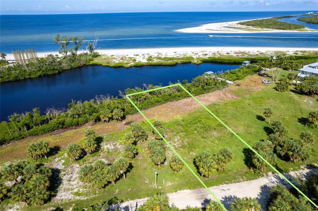 a view of a lake with a big yard