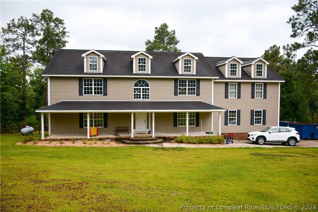 a front view of a house with swimming pool