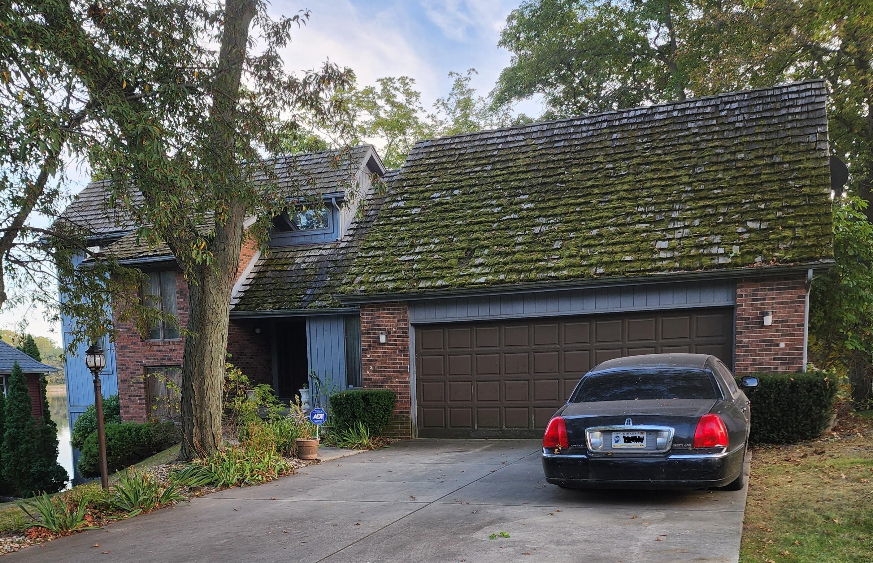 a car parked in front of a house