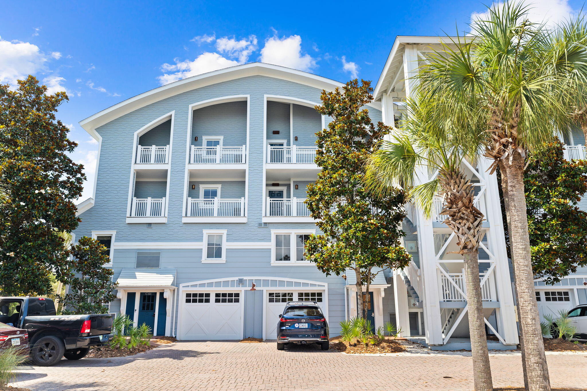 a front view of a building with street view