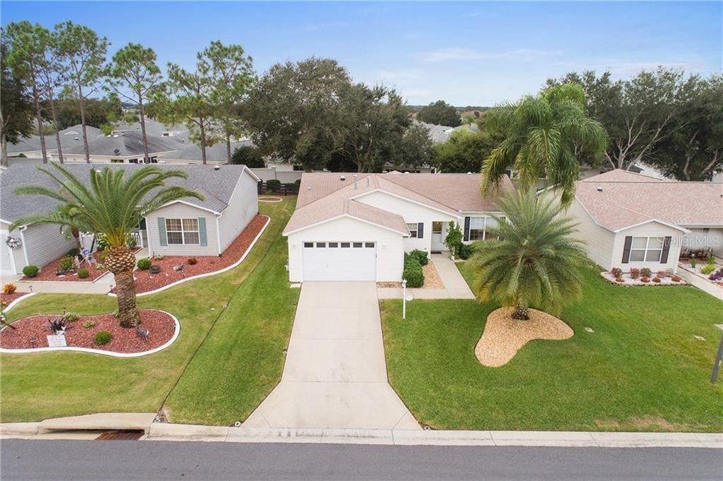 an aerial view of a house having yard