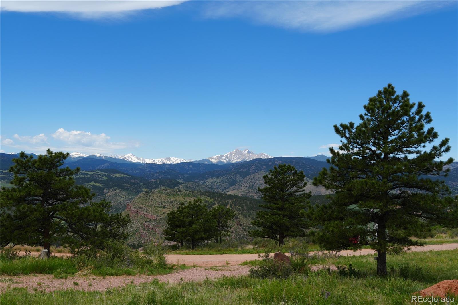 a view of a lush green mountain