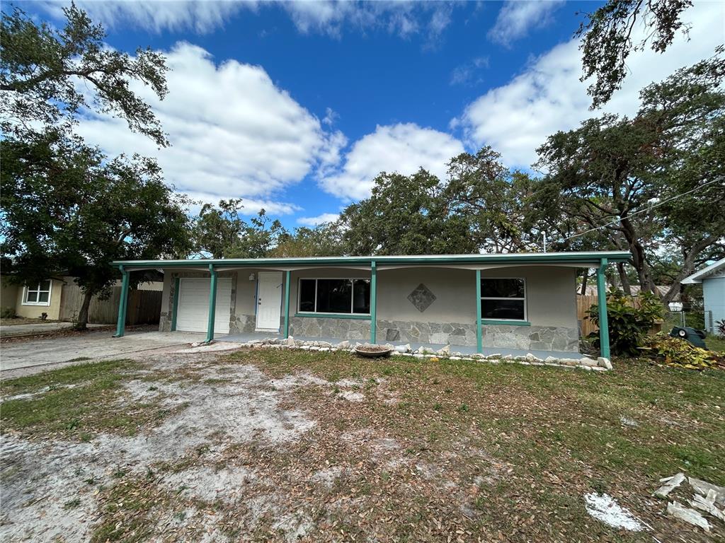 a house with trees in the background