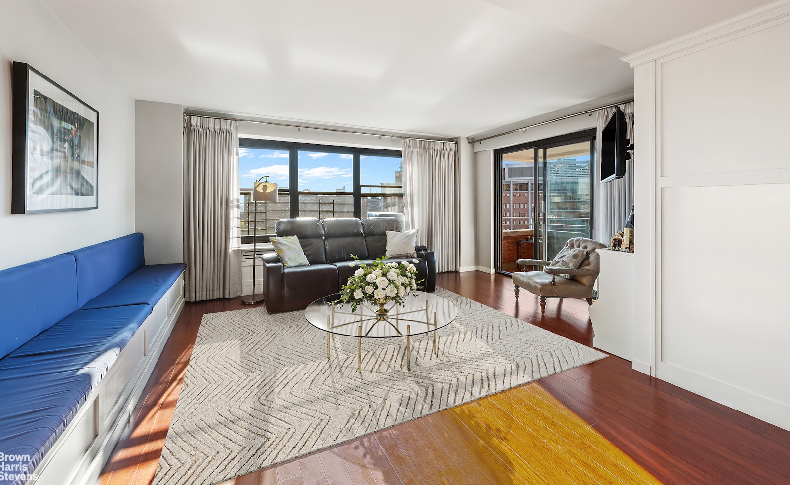 a living room with furniture and a table