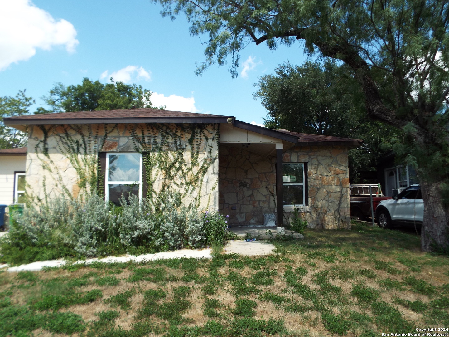 a view of a house with a garden