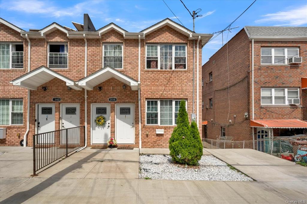 Townhome / multi-family property featuring cooling unit