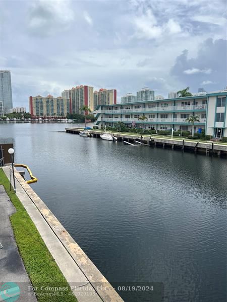 a view of a lake with a city