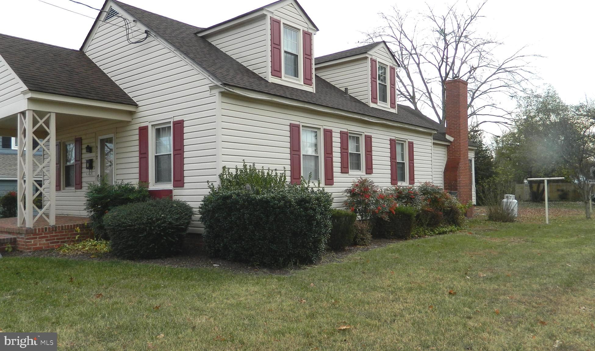 a view of a house with a garden