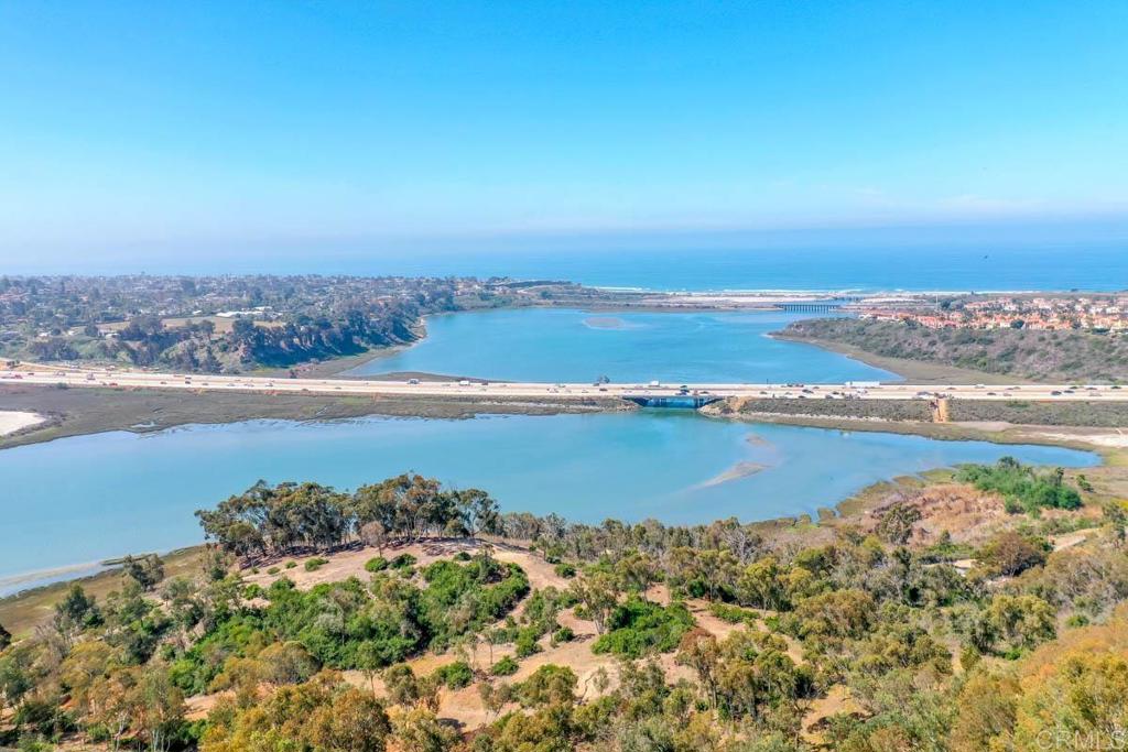 a view of a lake with a city