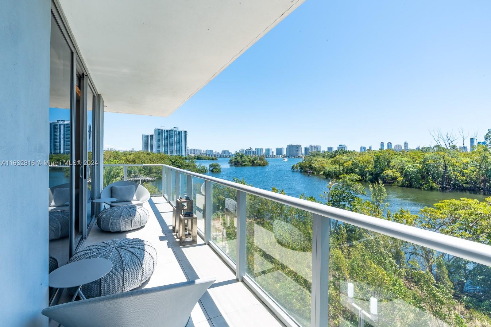 a view of balcony with furniture