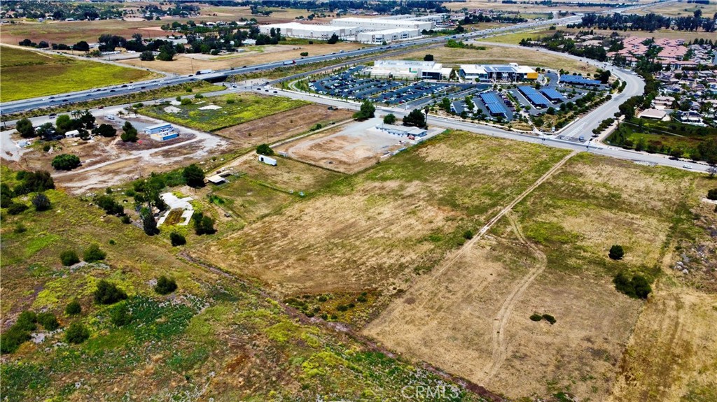 an aerial view of a swimming pool yard and outdoor seating