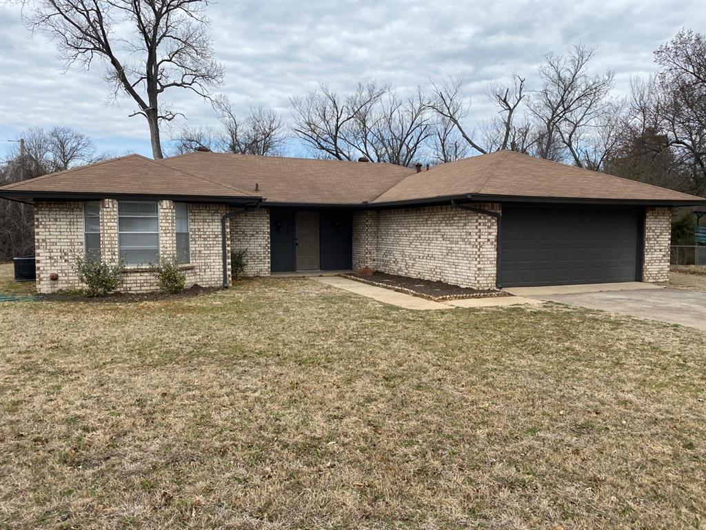 a house with trees in the background