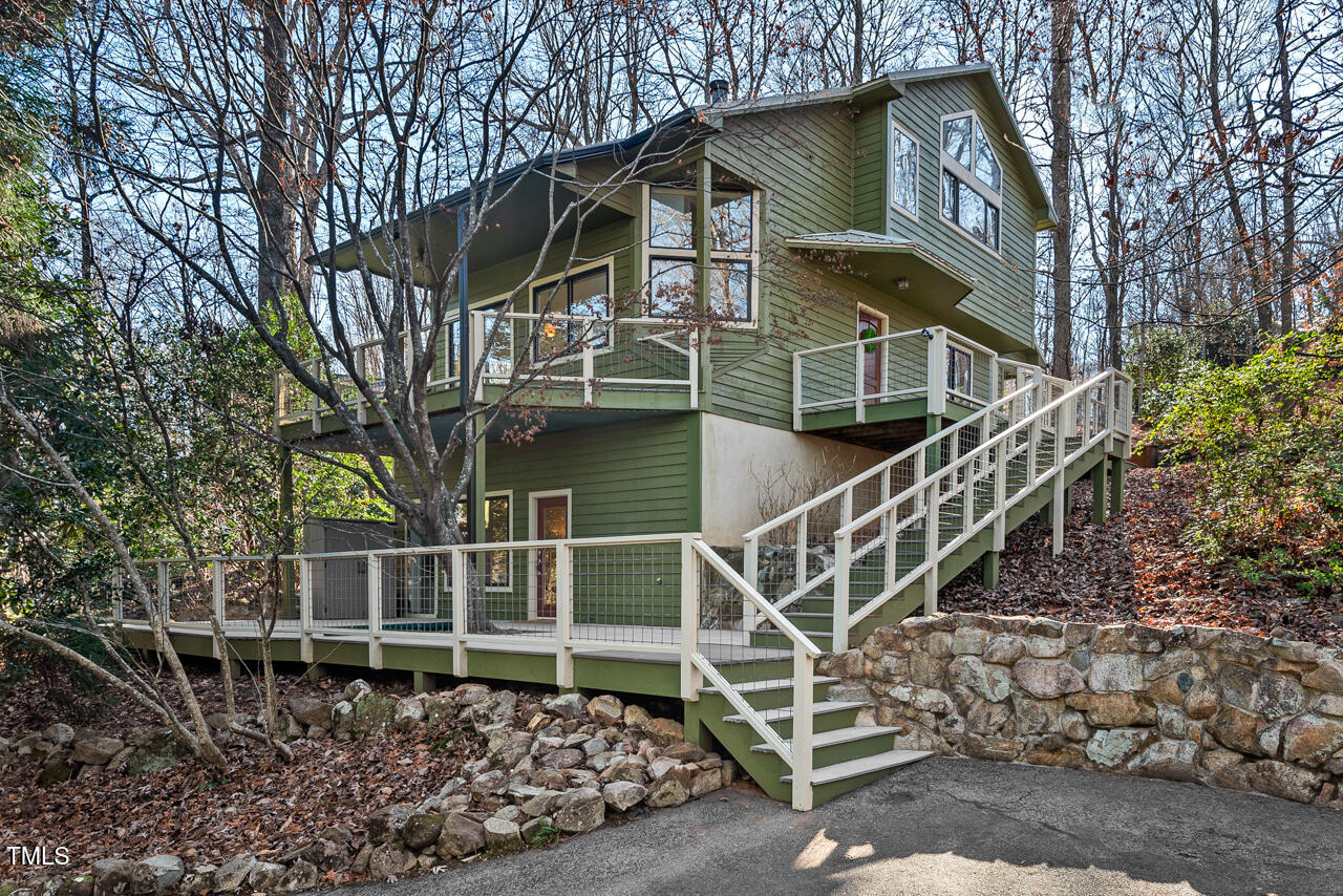 a house with trees in front of it