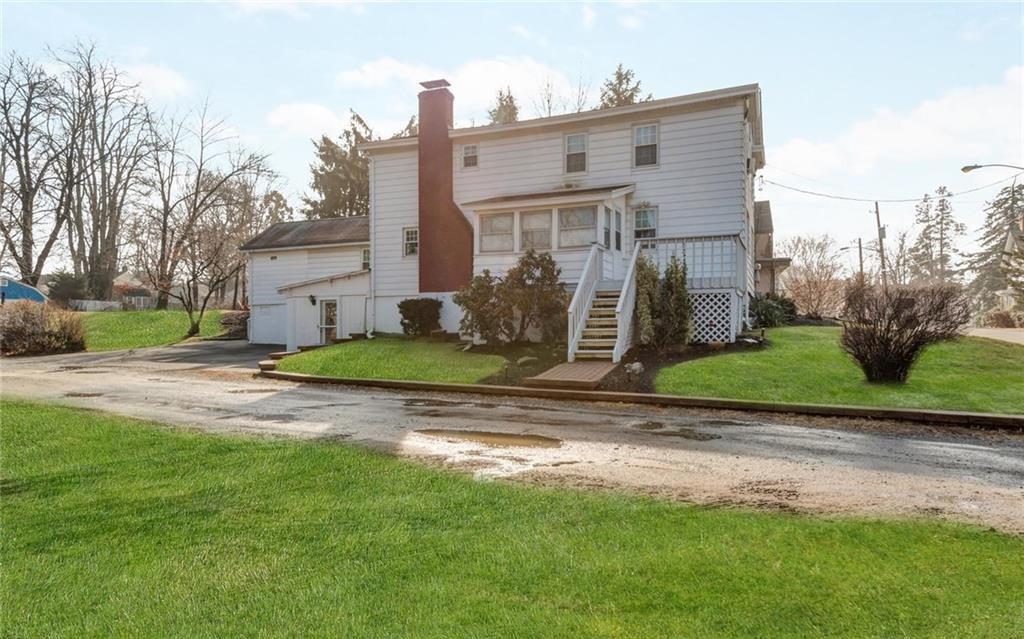 a front view of house with yard