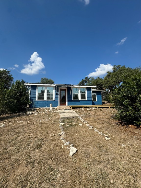 View from street, home is setback providing plenty of front yard space to enjoy from the newly constructed front deck