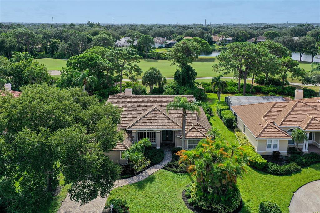 an aerial view of a house with a garden