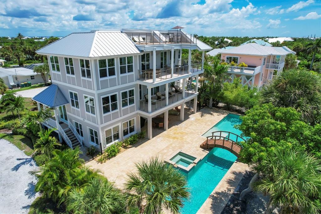 an aerial view of a house with a garden