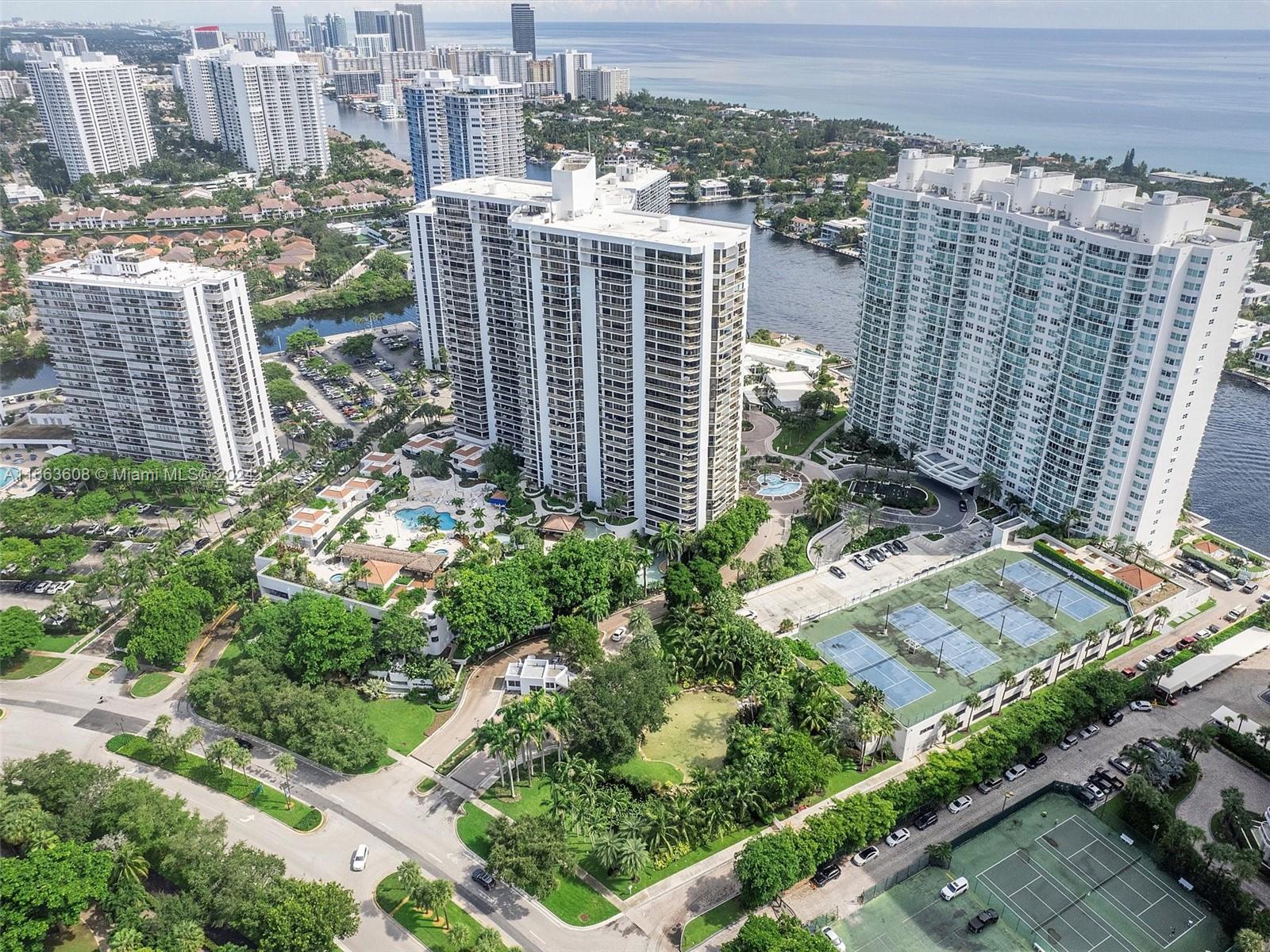 a view of a city with tall buildings