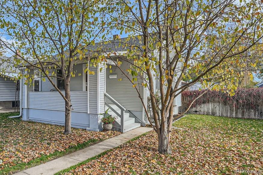 front view of a house with a trees