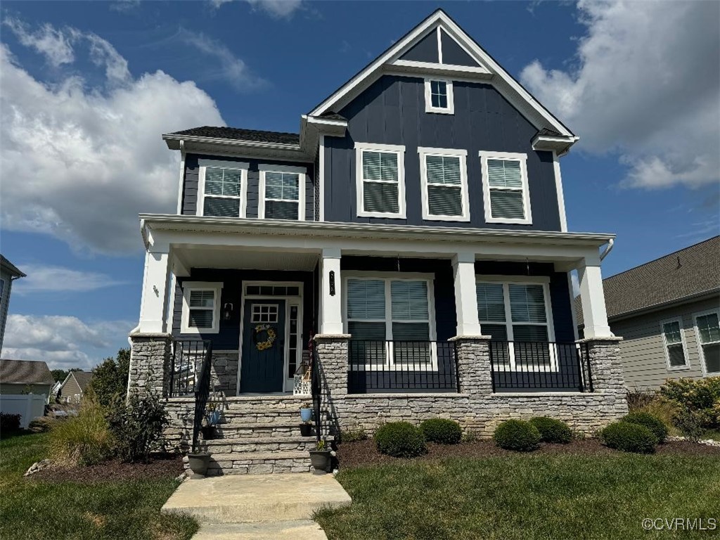 front view of a house with a yard