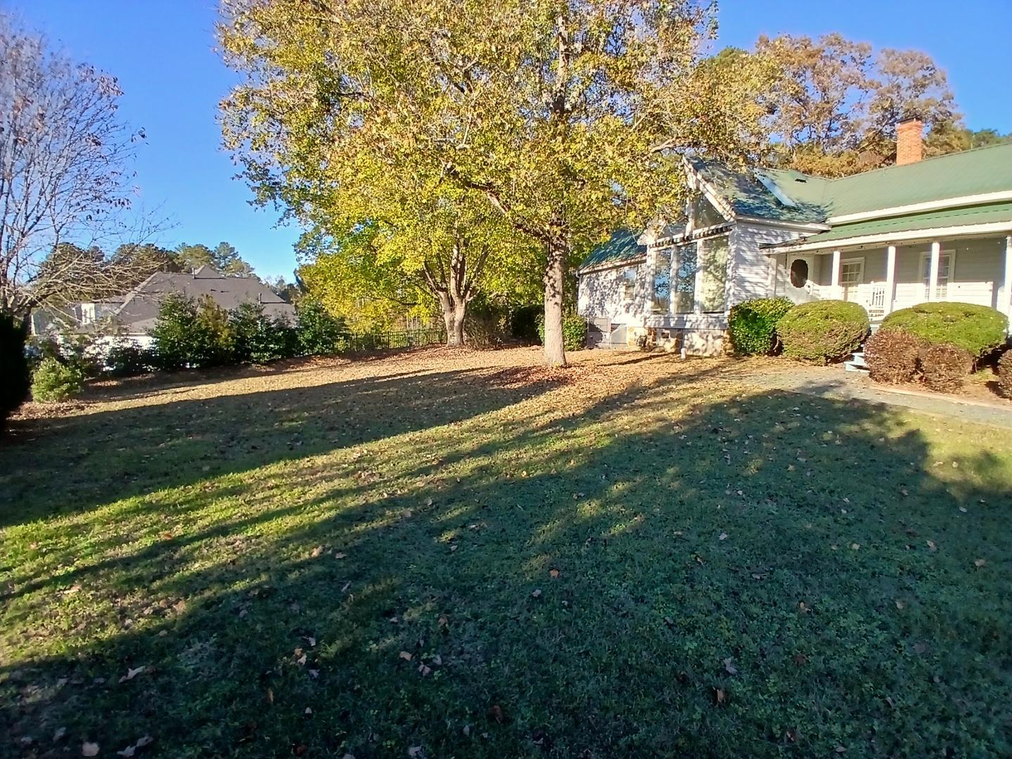 a view of a house with a big yard