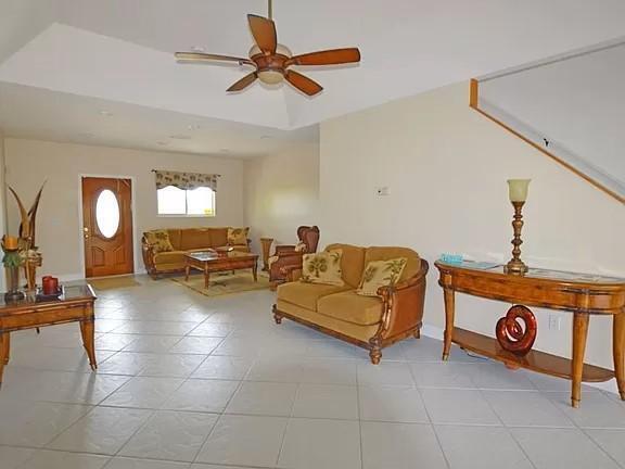 a living room with furniture and a table