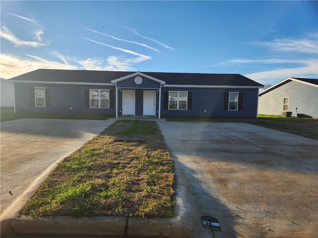 a front view of house along with yard